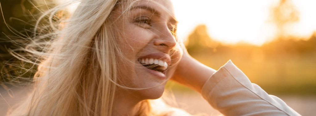 Woman in the Sun smiling